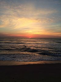 Scenic view of sea at sunset