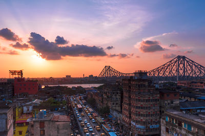 High angle view of buildings against sky during sunset