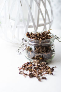 Close-up of dried food on white background