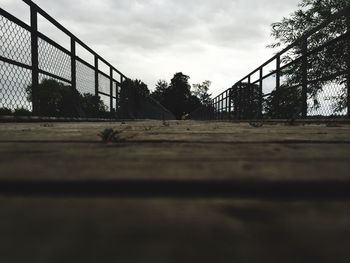 Wooden bridge with metal railing