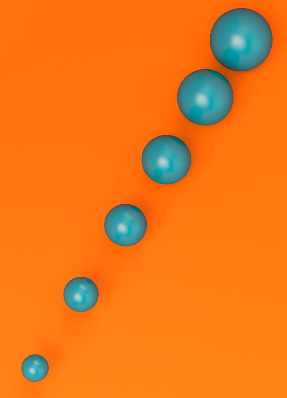 LOW ANGLE VIEW OF MULTI COLORED BALLOONS