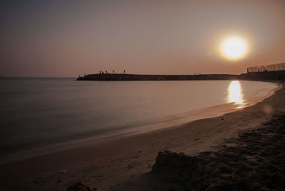 Scenic view of beach during sunset