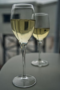 Close-up of wine in glass on table