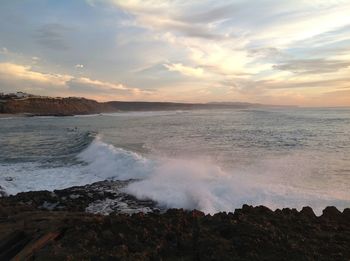 Scenic view of landscape against sky during sunset