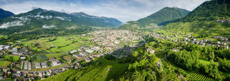 High angle view of trees and buildings against sky