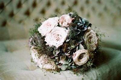 Close-up of rose bouquet on table during event