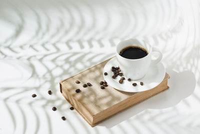 High angle view of coffee cup on table