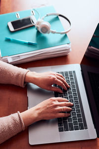 Woman working talking doing her job remotely during video chat phone call on laptop from home