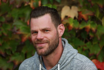 Close-up portrait of a smiling young man