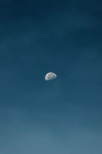 Low angle view of moon in clear sky at night