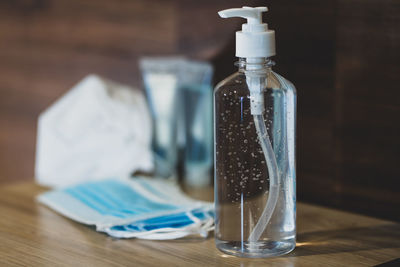 Close-up of water bottle on table