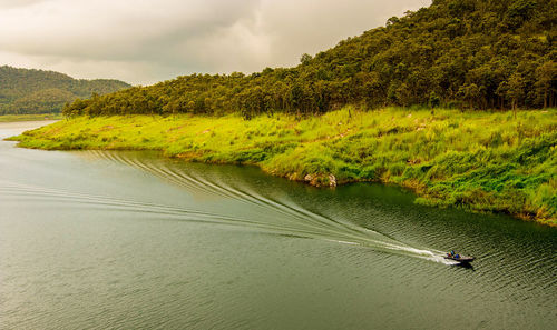 Scenic view of river against sky