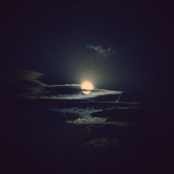 Scenic view of landscape against sky at night