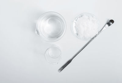 High angle view of glass of water on table