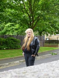 Full length of woman standing in park