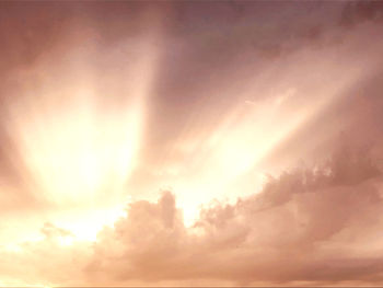 Low angle view of dramatic sky during sunset