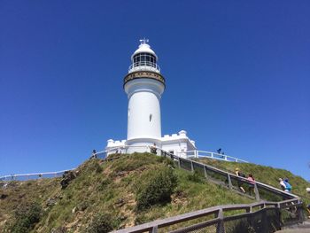 Low angle view of cape byron lighthouse against clear blue sky