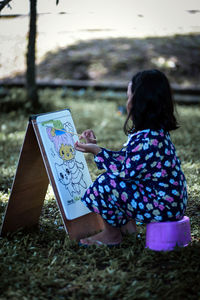 Young woman using digital tablet