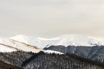 Snow covered mountain peak winter panorama landscape