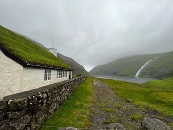 Grass roofed houses of the faroe islands, scenic view of the village of saksun faroe islands, 