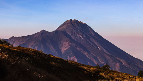 Scenic view of mountains against clear sky