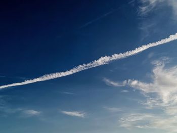 Low angle view of vapor trail in sky