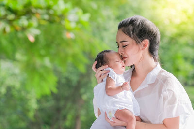 Mother and daughter outdoors