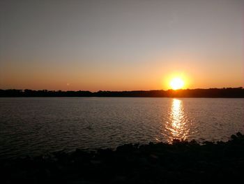 Scenic view of sunset over river