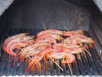 High angle view of crab on barbecue grill