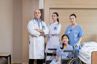 Portrait of doctors standing in hospital