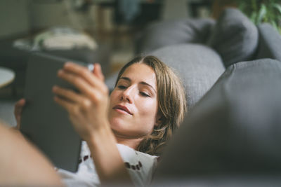 Young woman using mobile phone