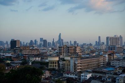 High angle view of buildings in city against sky