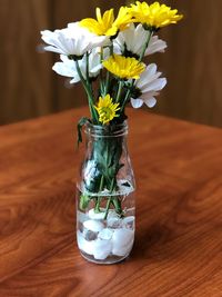 Close-up of flower vase on table