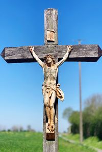 View of cross against clear sky