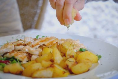 Close-up of hand holding food