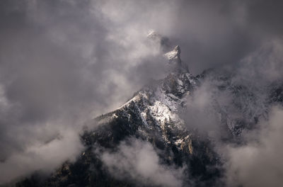 The grand tetons in the clouds