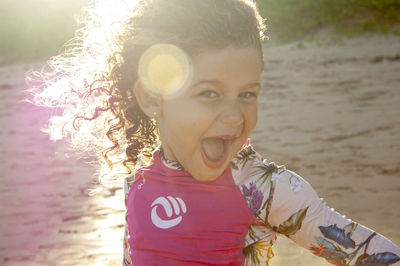 Portrait of smiling girl on beach