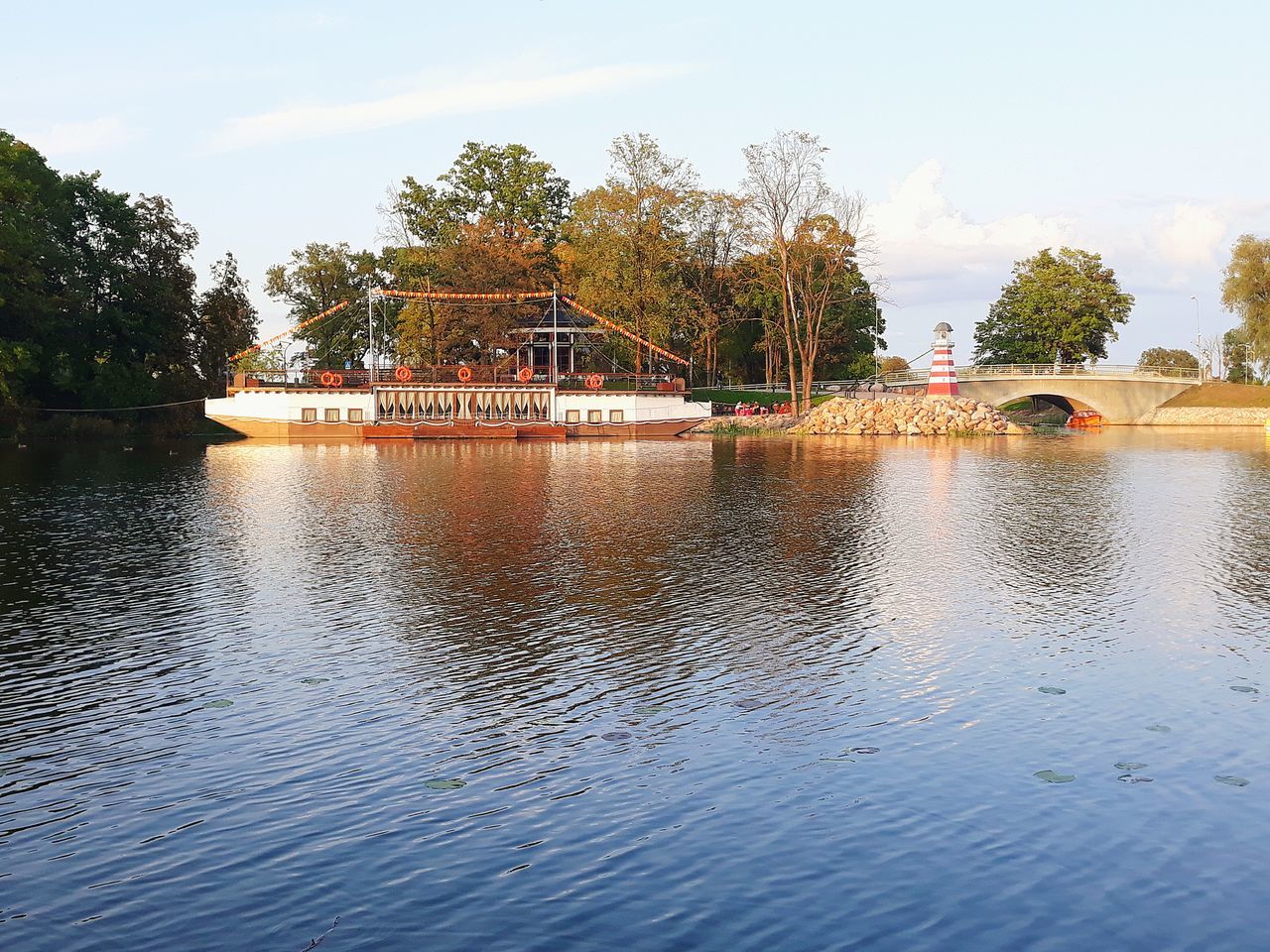 water, tree, waterfront, sky, plant, architecture, nature, built structure, river, reflection, day, cloud - sky, beauty in nature, scenics - nature, transportation, no people, tranquil scene, nautical vessel, outdoors