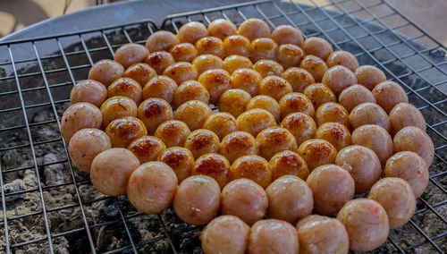 High angle view of meat on barbecue grill