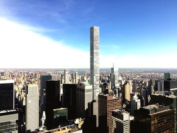 Modern buildings in city against sky