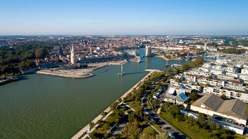 High angle view of river amidst buildings in city