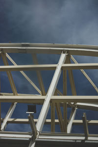Low angle view of metallic structure against sky