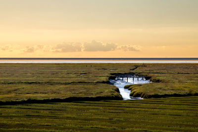 Scenic view of sea against sky during sunset