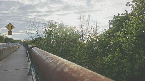 View of road against cloudy sky