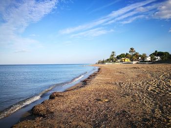 Scenic view of beach against sky