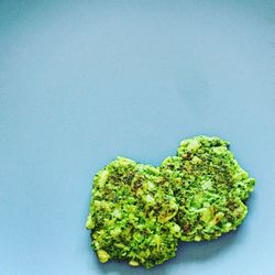 Close-up of fruit over white background