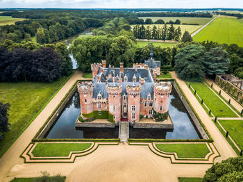 High angle view of palace amidst over pond amidst garden