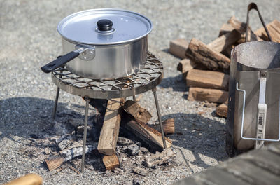 High angle view of food being cooked in pan at campsite