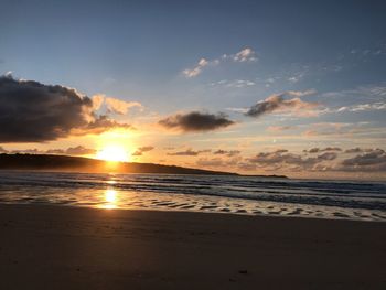 Scenic view of sea against sky during sunset