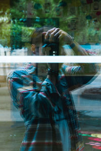 Close-up of woman with reflection